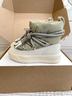 Moncler high-top sneaker with sage green padded collar, gray laces, and white midsole