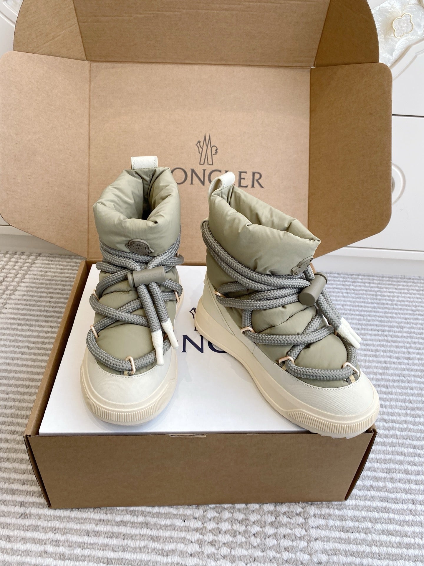 Moncler high-top sneakers, pair in box, sage green uppers with gray laces and white soles