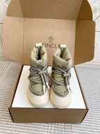 Moncler high-top sneakers in light sage green with gray laces and white sole