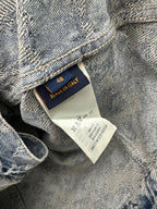 Denim jacket inside label reading “48” and “Made in Italy” on fabric tag
