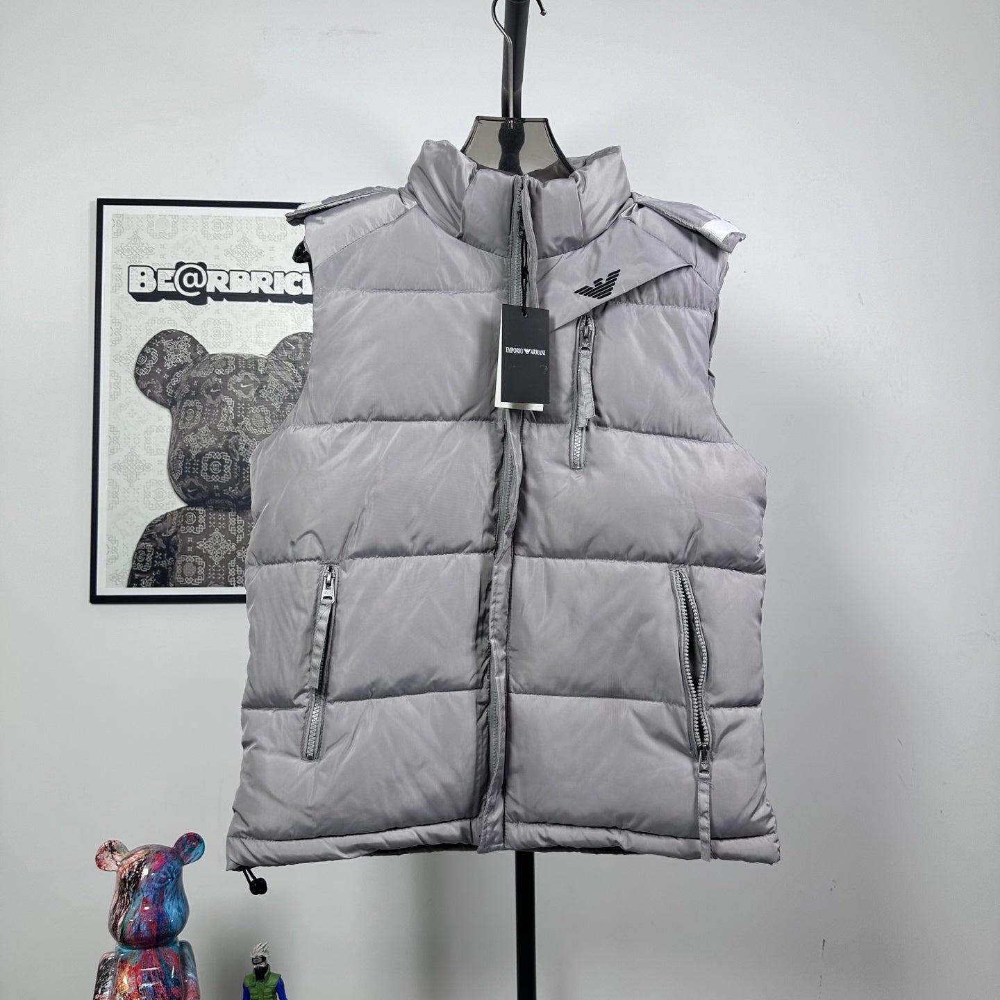 Amiri hooded puffer vest, light gray, front zip closure and chest logo