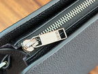 Dior small bag zipper detail with Dior logo plaque and silver hardware