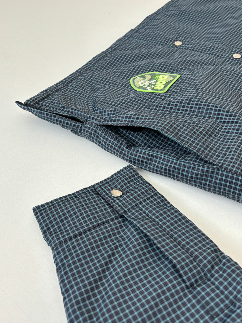 Checkered long-sleeve shirt with button front, chest pocket, dark teal