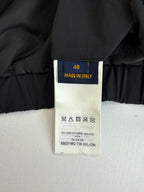 Size 48 label on dark jacket lining, Made in Italy