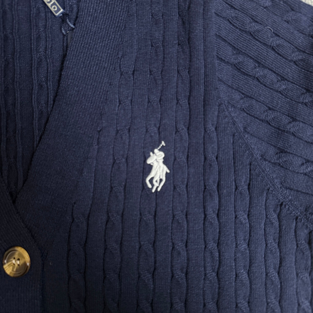 Navy cable-knit cardigan with embroidered polo horse emblem and button edge