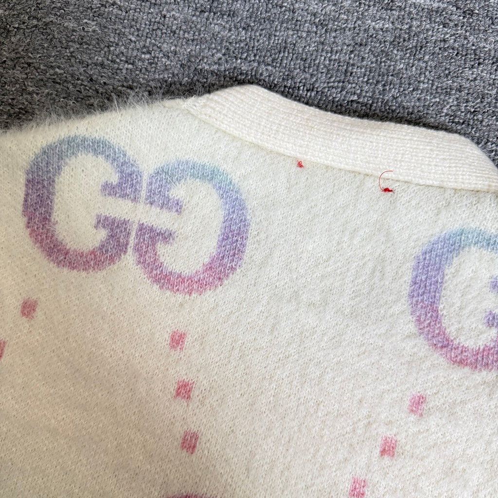 Gucci knit cardigan back detail, off-white knit with purple-blue GG graphic and speckles