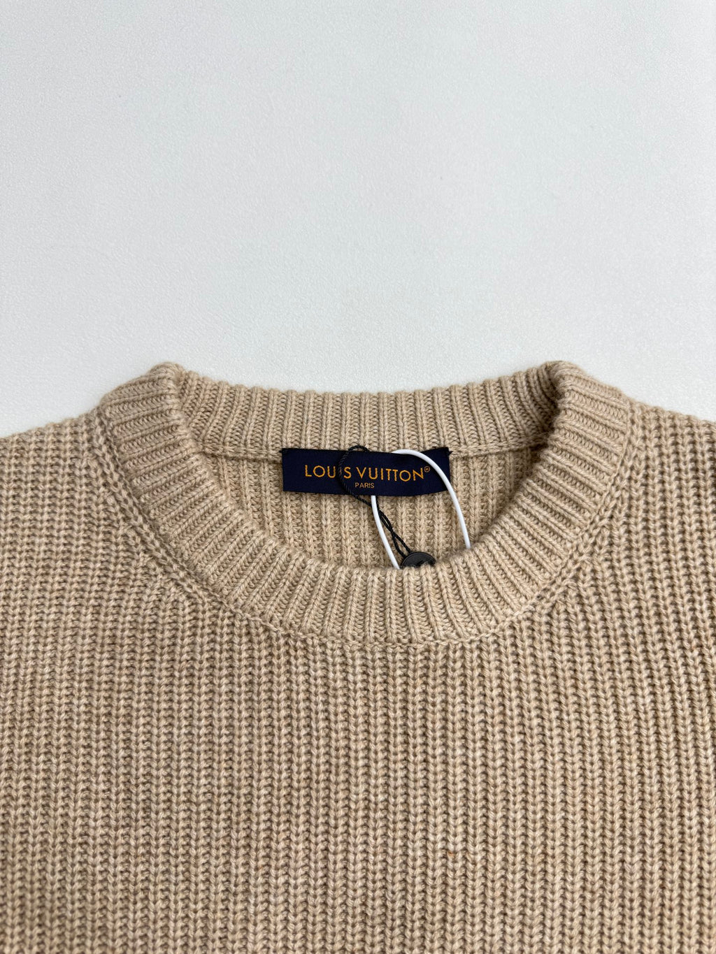 Beige ribbed crewneck sweater with Louis Vuitton neck label