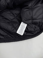 Ralph Lauren polo jacket interior with care label in dark black quilted lining