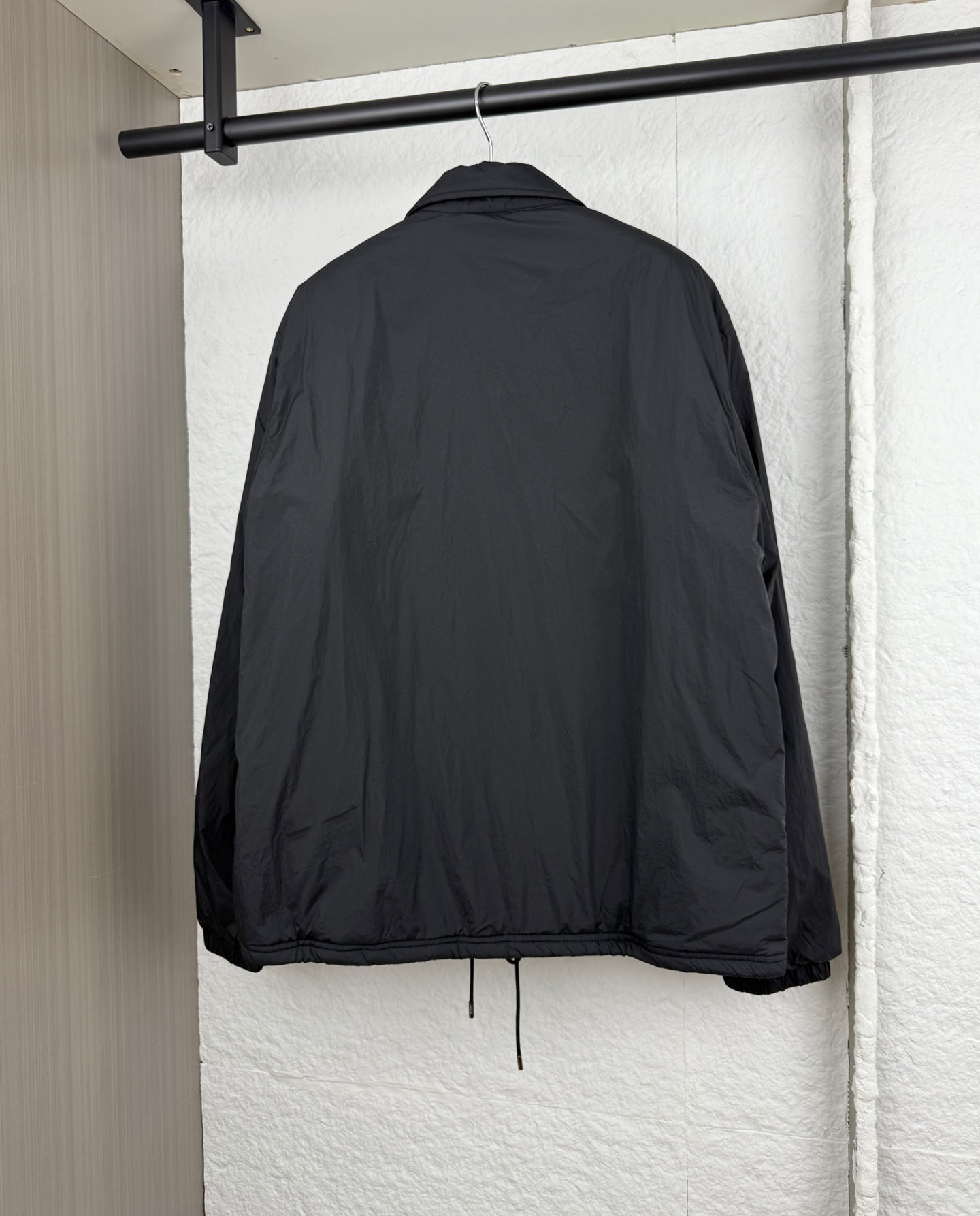 Ralph Lauren polo jacket in dark black, back view with button placket