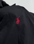 Ralph Lauren polo jacket with red embroidered pony logo on dark black chest