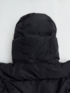 Black long puffer jacket hood and shoulder area with buttoned neck