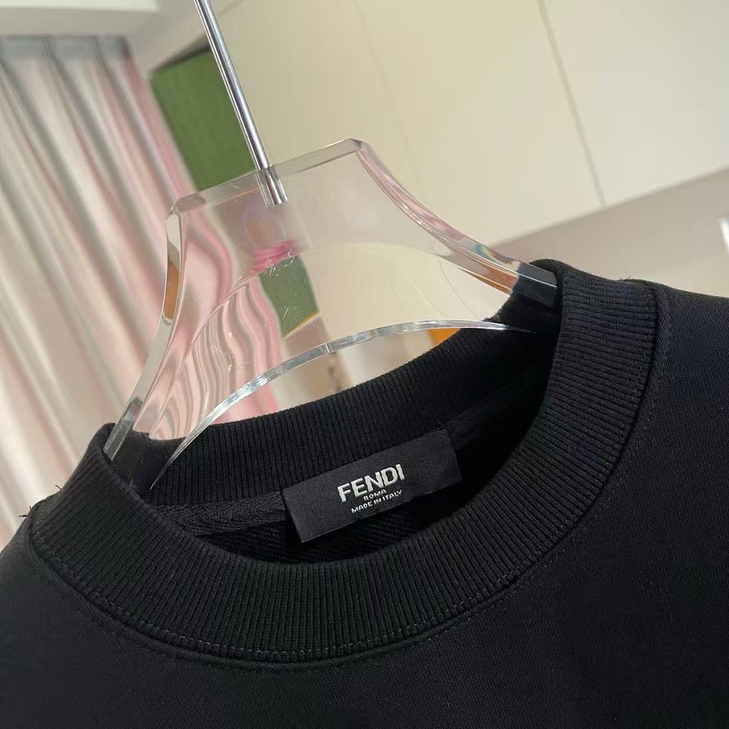 Black crewneck sweatshirt neckline with FENDI brand label