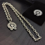 Chrome pendant necklaces with round cross emblem pendants on silver-toned chain
