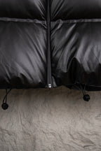 Prada long dark puffer jacket with front zipper and quilted panels