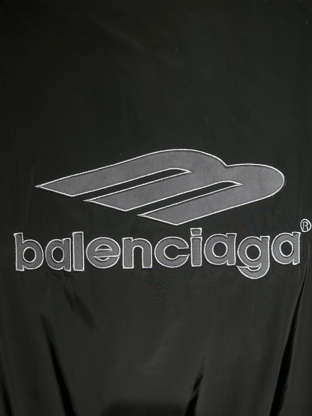 Black track jacket front with large Balenciaga logo print