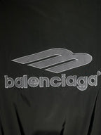 Black track jacket front with large Balenciaga logo print