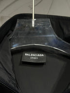 Black jacket with Balenciaga lining label and exposed neck tag