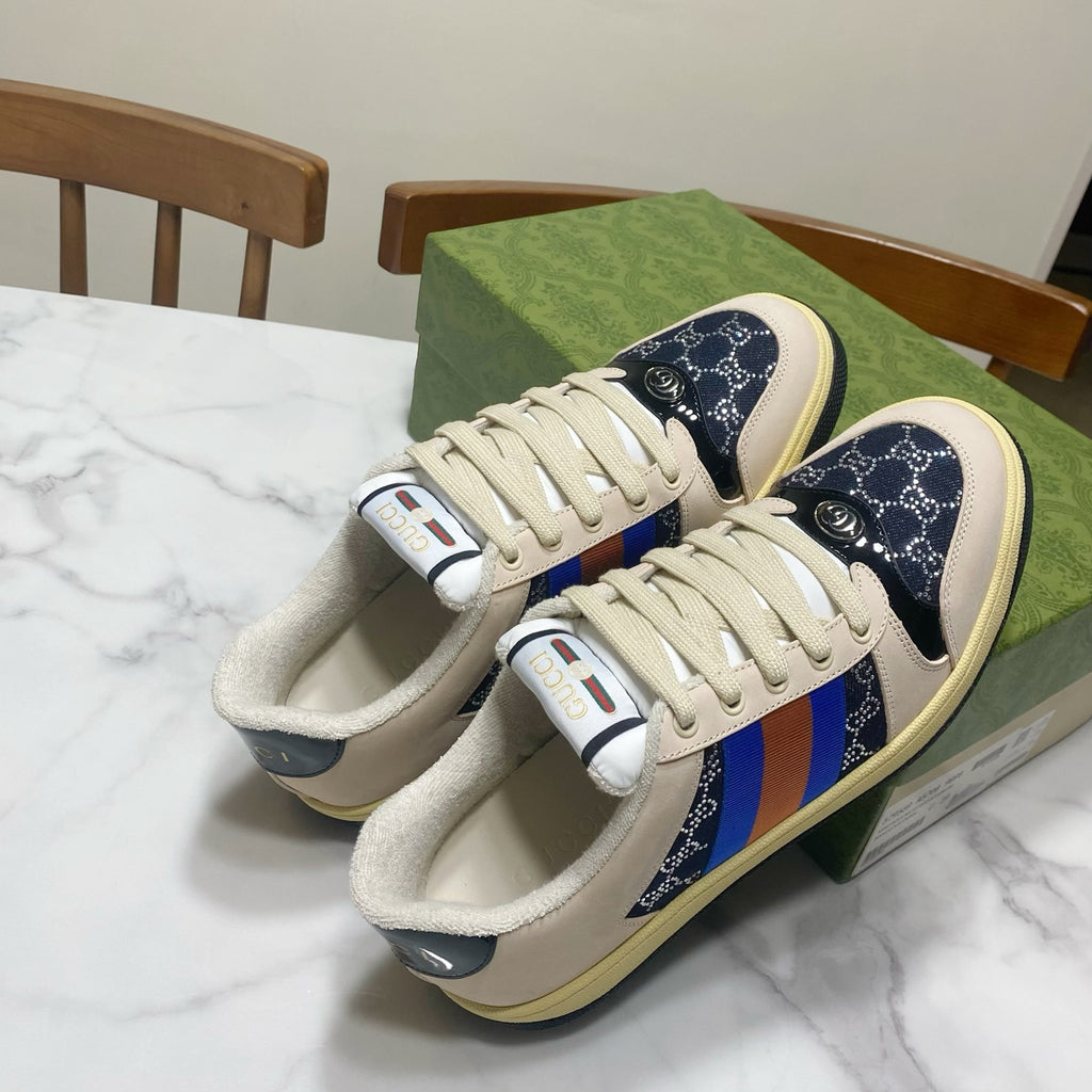 Gucci unisex lace-up sneakers, cream uppers with navy side panels and stripe trim