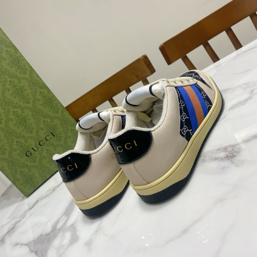 Gucci unisex sneakers, cream leather with navy heel panels and multicolor stripe band