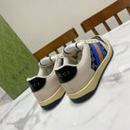 Gucci unisex sneakers, cream leather with navy heel panels and multicolor stripe band