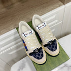 Gucci unisex sneakers, cream canvas with navy toe and multicolor stripe accents