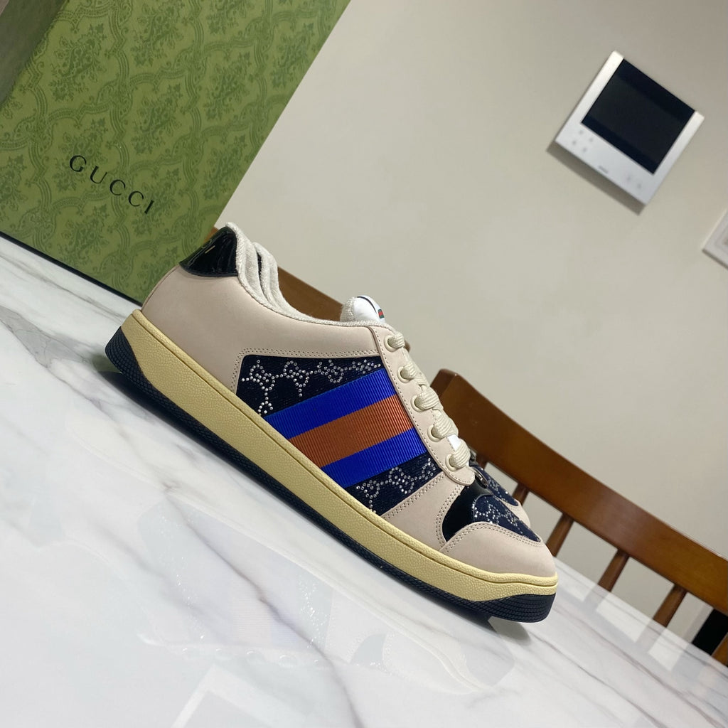 Gucci unisex low-top sneakers, cream upper with navy toe and multicolor stripe