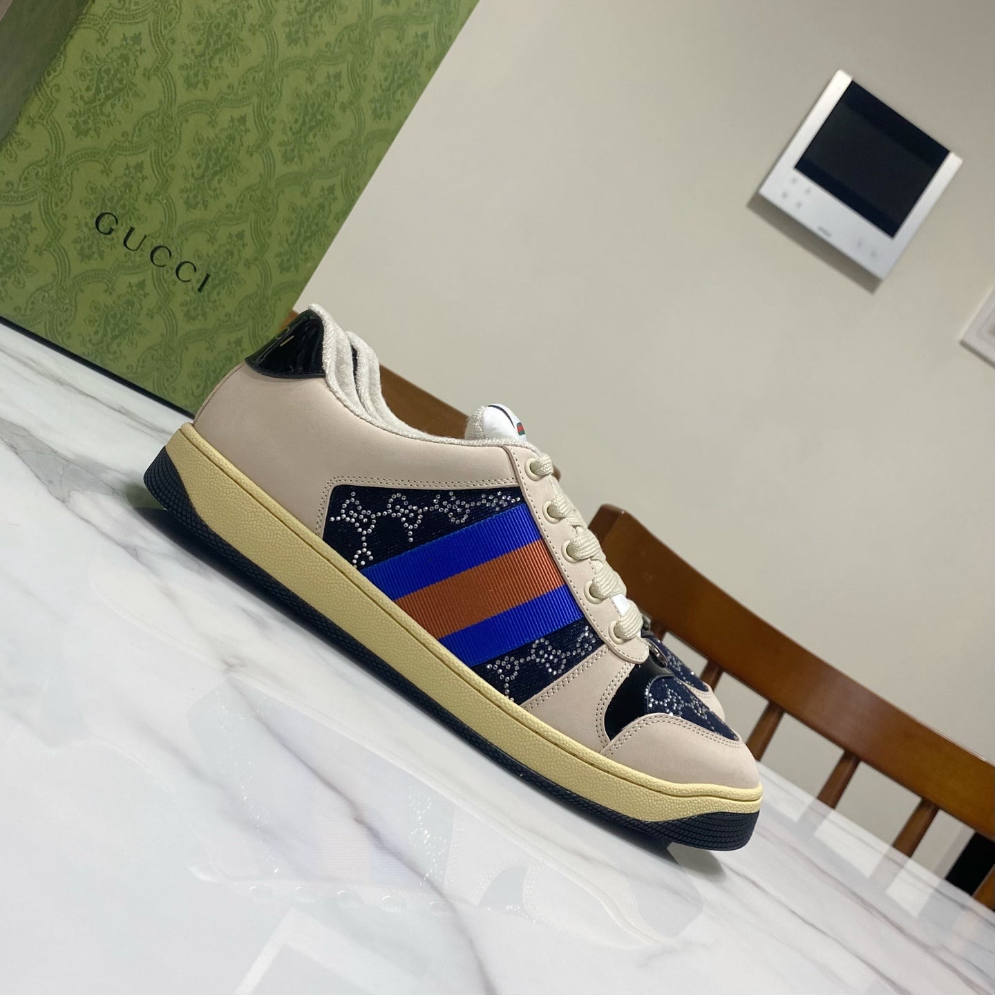 Gucci unisex low-top sneakers, cream upper with navy toe and multicolor stripe