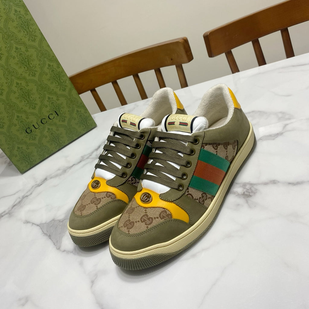 Low-top unisex sneakers in olive canvas with multicolor stripe accents and yellow details
