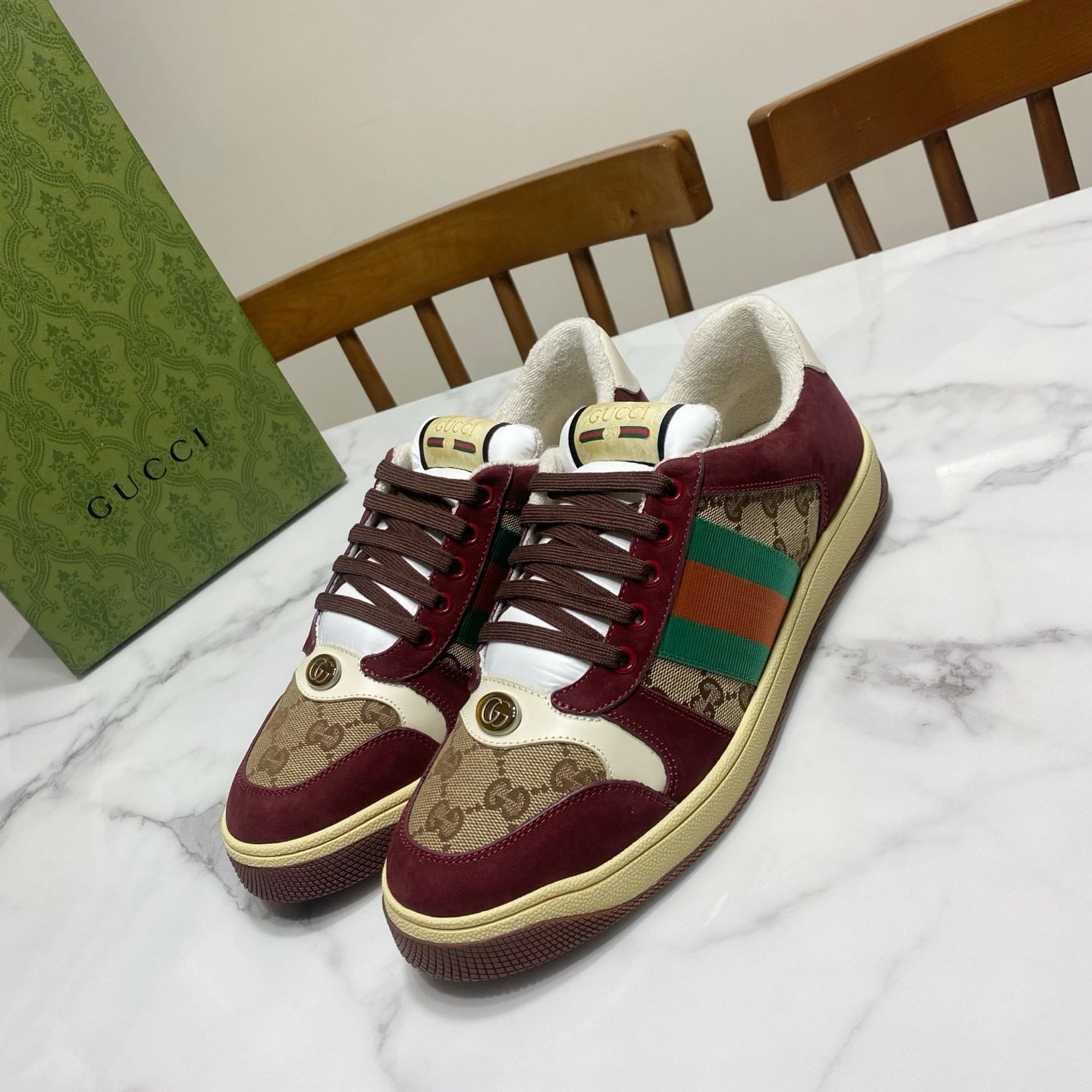 Gucci unisex sneakers in burgundy with GG canvas panels and striped web side detail