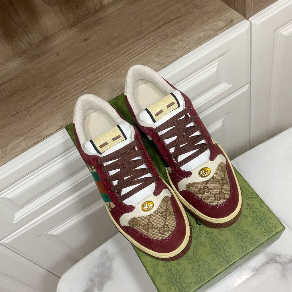 Gucci unisex sneakers, burgundy suede with GG canvas, lace-up eyelets, and gold emblem