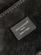 Louis Vuitton Paris label on black leather lining, made in Spain