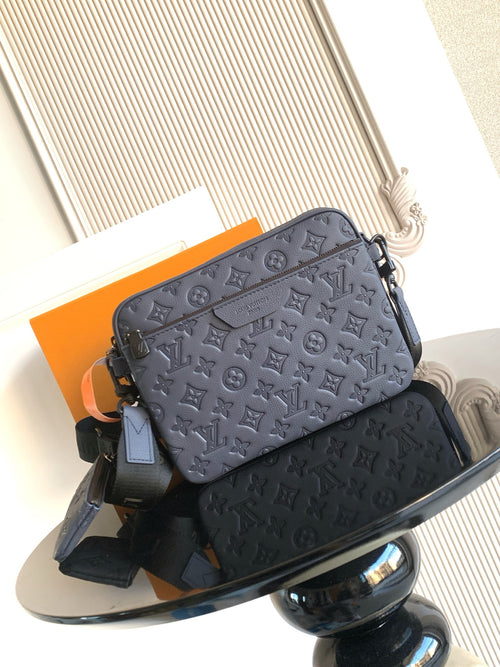 Men's Louis Vuitton crossbody bag in dark blue with monogram embossing and zipper top