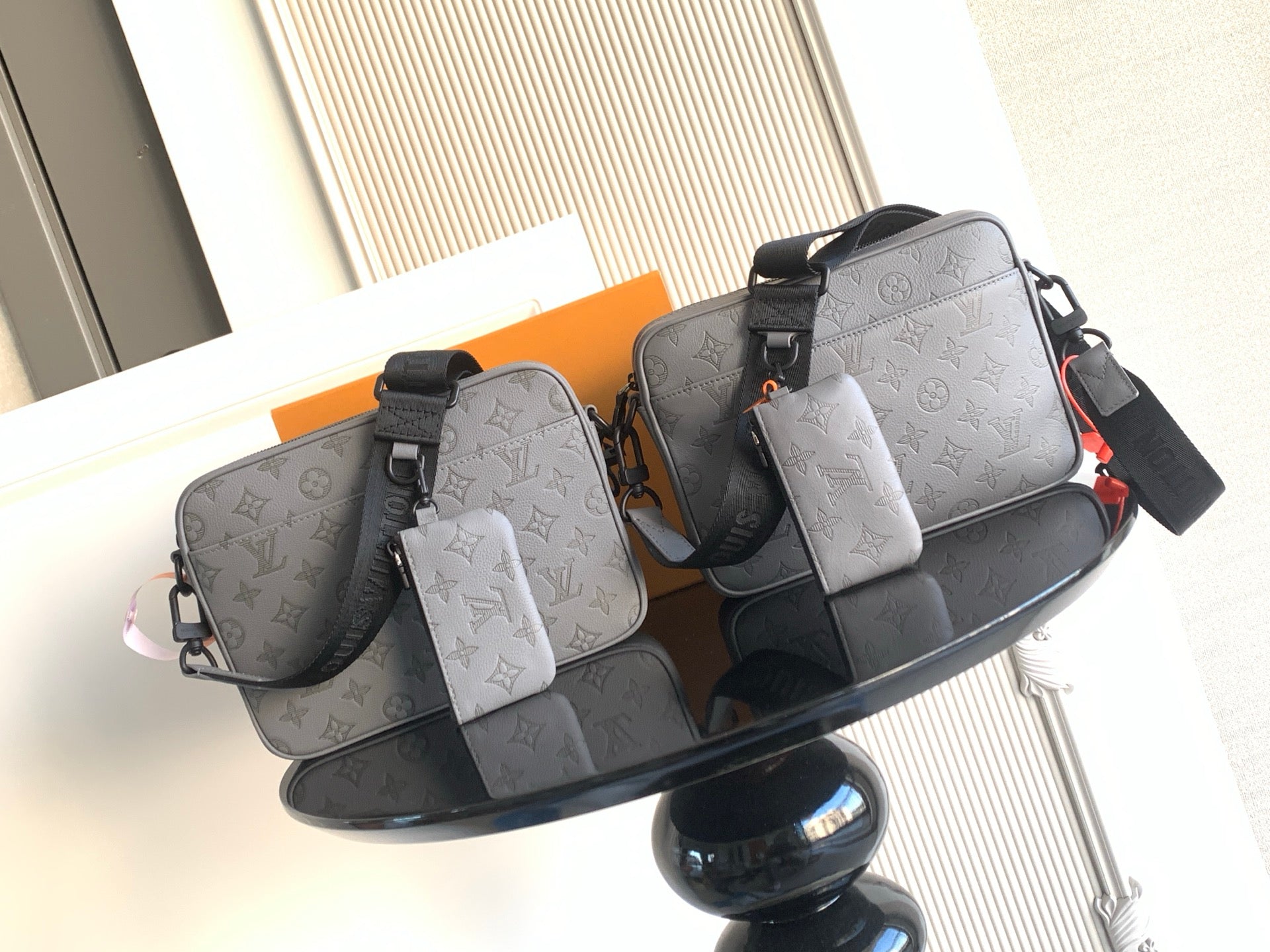 Louis Vuitton monogram crossbody bag pair, light gray and dark gray with side pockets