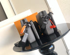 Louis Vuitton monogram crossbody bags, gray and black set with red charm and straps