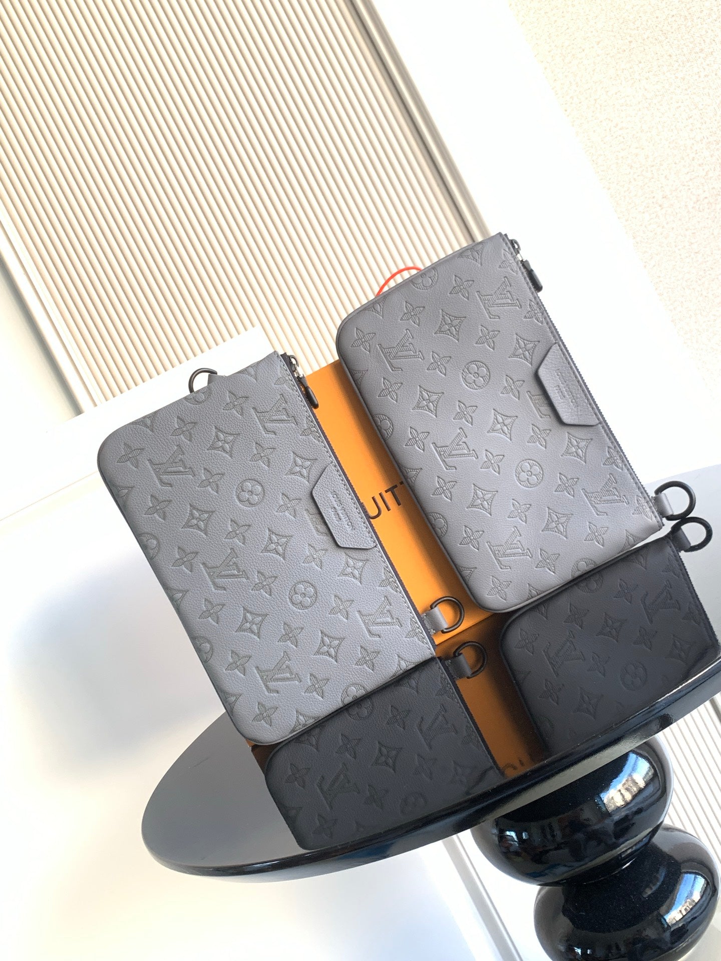 Louis Vuitton monogram crossbody bags, light gray with side straps and metal rings