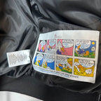 Moncler long puffer jacket inside label pouch with care instructions
