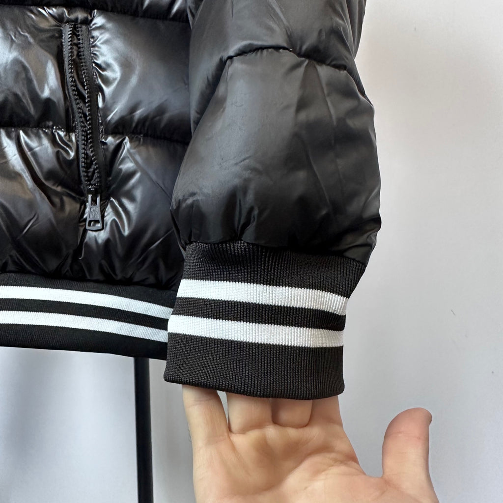 Moncler long puffer jacket sleeve, ribbed cuff with white striped band