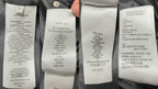 Fabric and care labels inside mauve Dior puffer jacket
