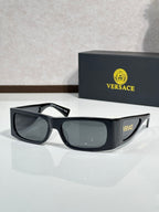 Versace sunglasses with black frame and smoked lenses