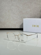 Dior eyeglasses with clear/metal round frames and clear lenses, logo on bridge