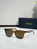 Balenciaga sunglasses with tortoise frame and amber lenses