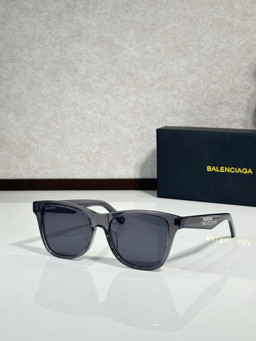 Balenciaga sunglasses with black frame and dark gray lenses