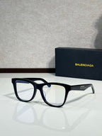 Balenciaga sunglasses with black frame and clear lenses