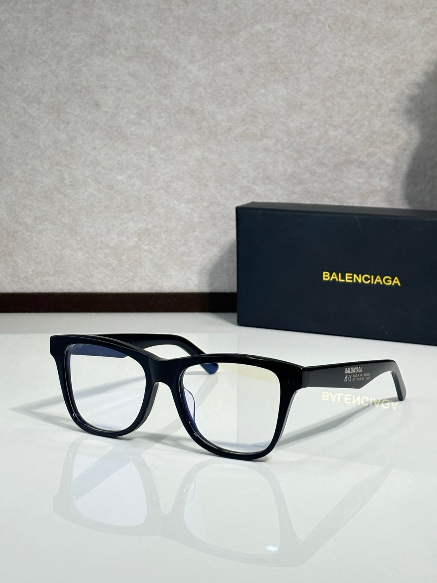Balenciaga sunglasses with black frame and clear lenses