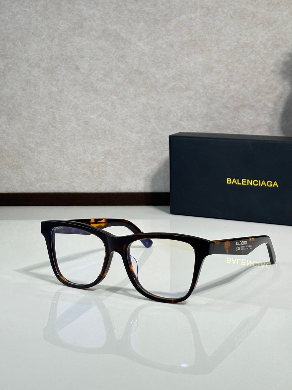 Balenciaga sunglasses with black translucent frame and clear lenses