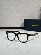Balenciaga sunglasses with black translucent frame and clear lenses