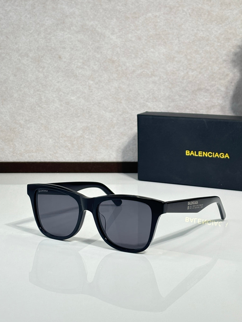 Balenciaga sunglasses with black frame and dark lenses