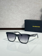 Balenciaga sunglasses with black frame and dark gray gradient lenses