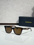 Balenciaga sunglasses with tortoise frame and brown gradient lenses