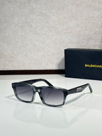 Balenciaga oversized square sunglasses with dark frame and smoked lenses